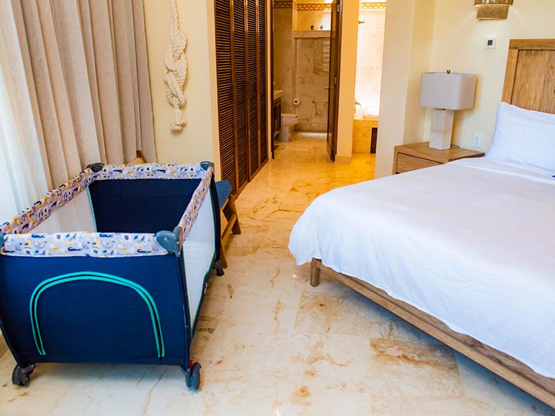 Exterior view of Porto Playa Condo 207 from landscaped garden path