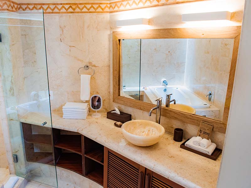 Porto Playa Condo 207 seen from tropical garden walkway