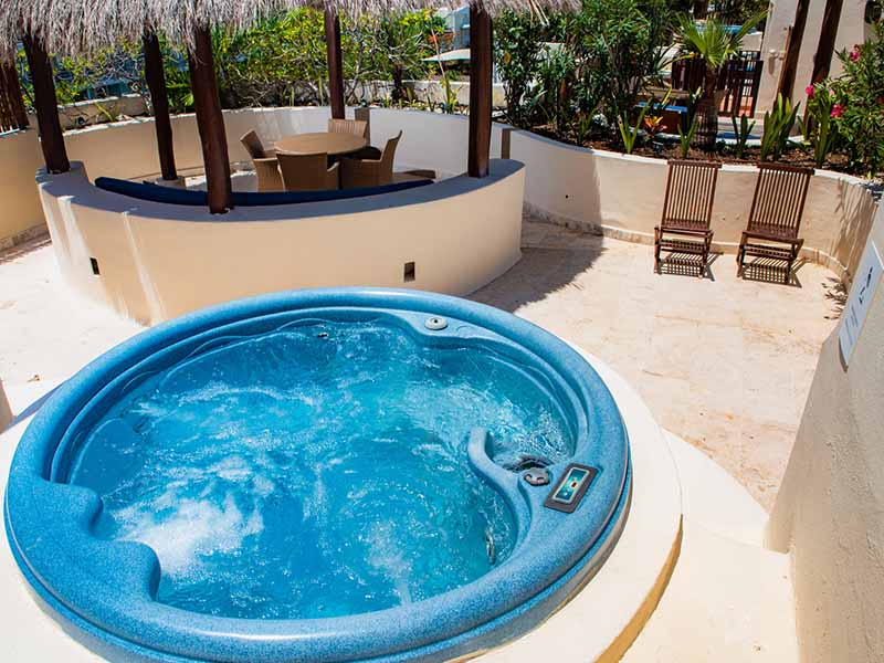 Porto Playa Condo 207 entrance view from garden path