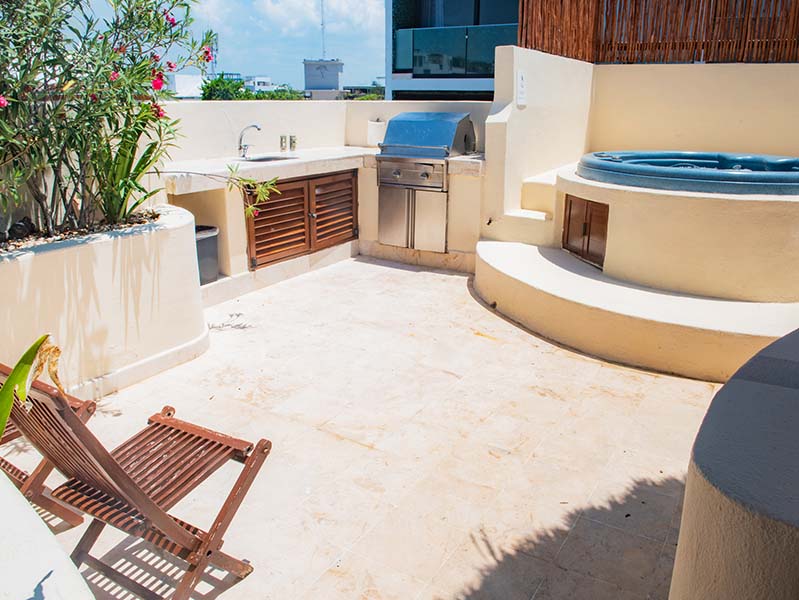 Tropical garden path leading to Porto Playa Condo 207